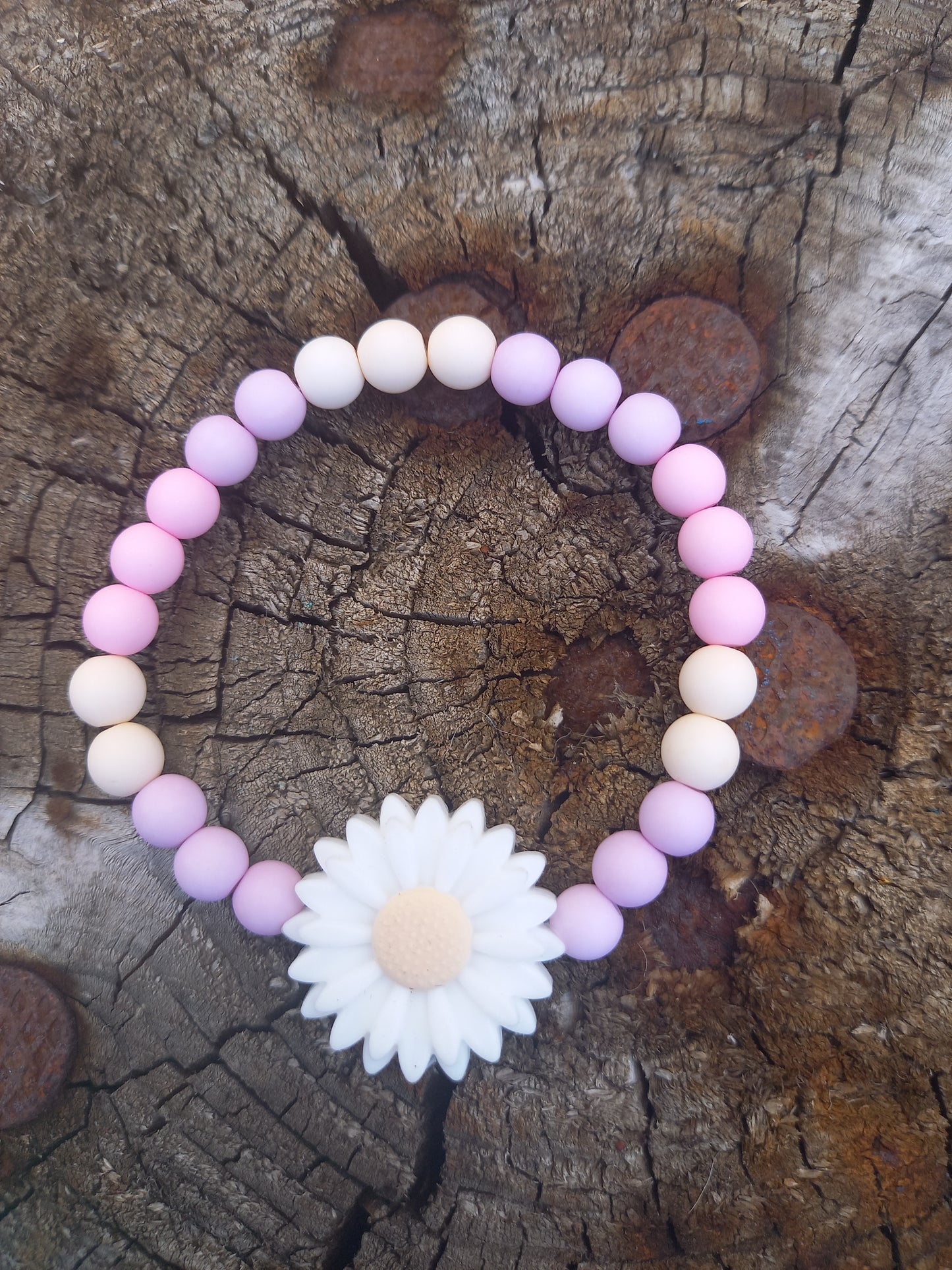 Kinderarmband madelief roze/lila
