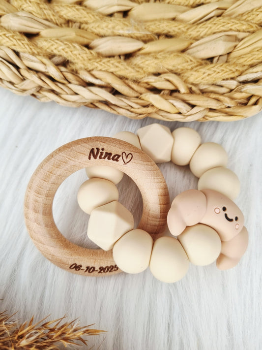 Bijtring gegraveerd met figuurtje
Croissant, beige