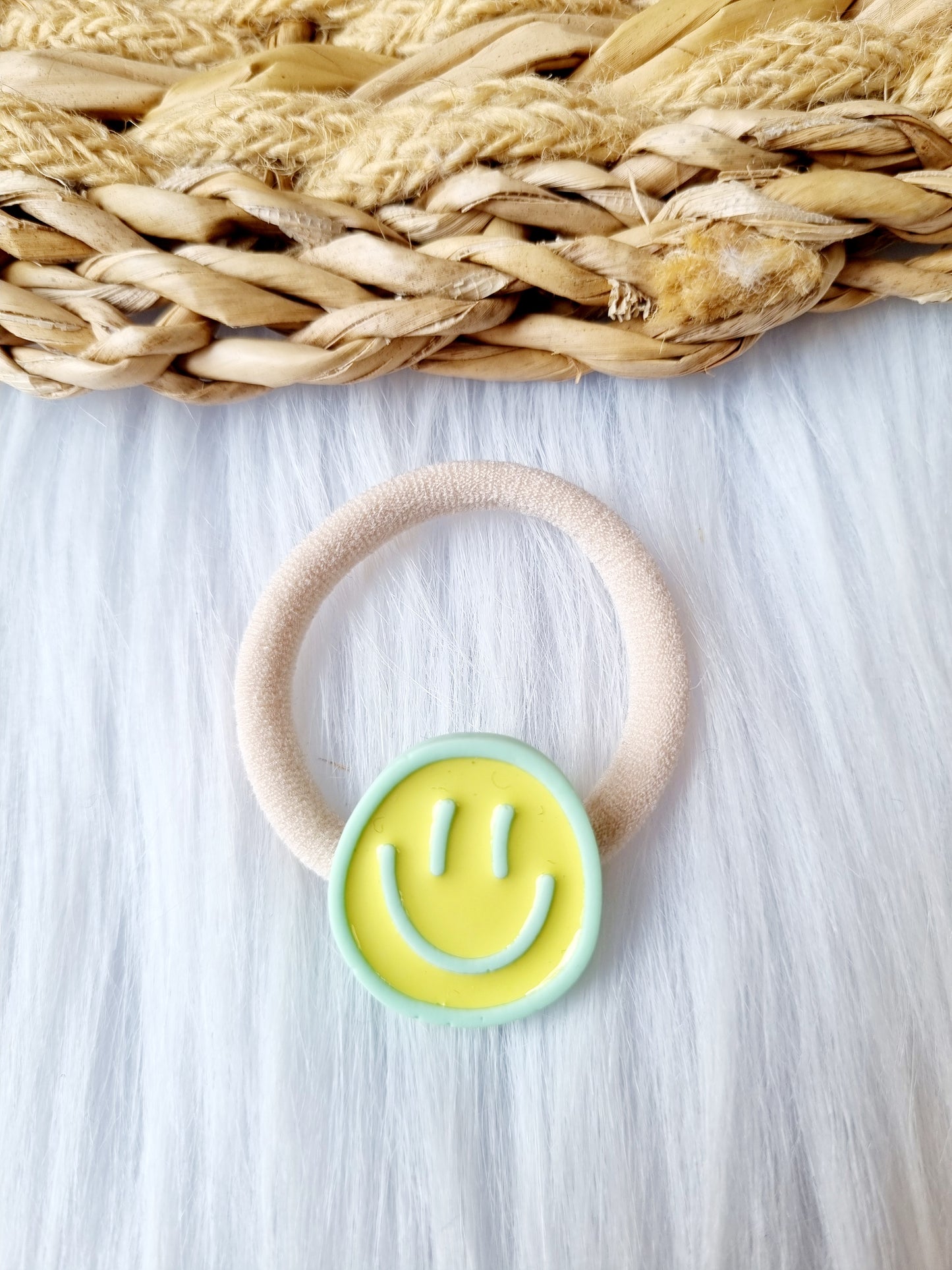 Haar elastiekje smiley geel