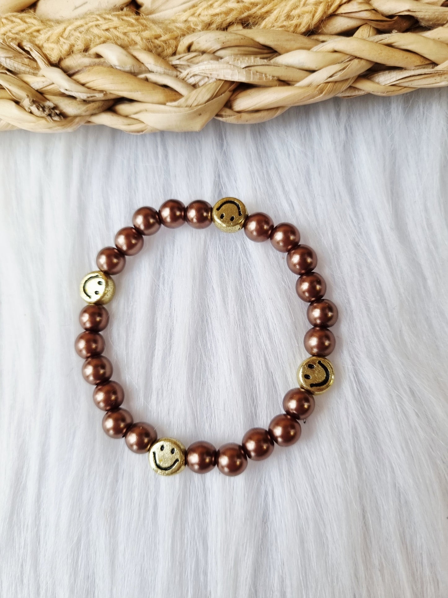 Kinderarmband - Pearl smiley goud donkerbruin