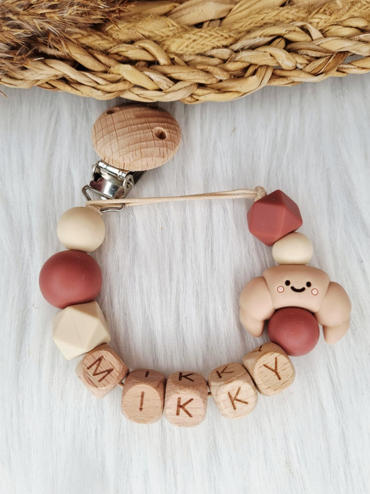 Speenkoord met naam croissant beige, woodchuck