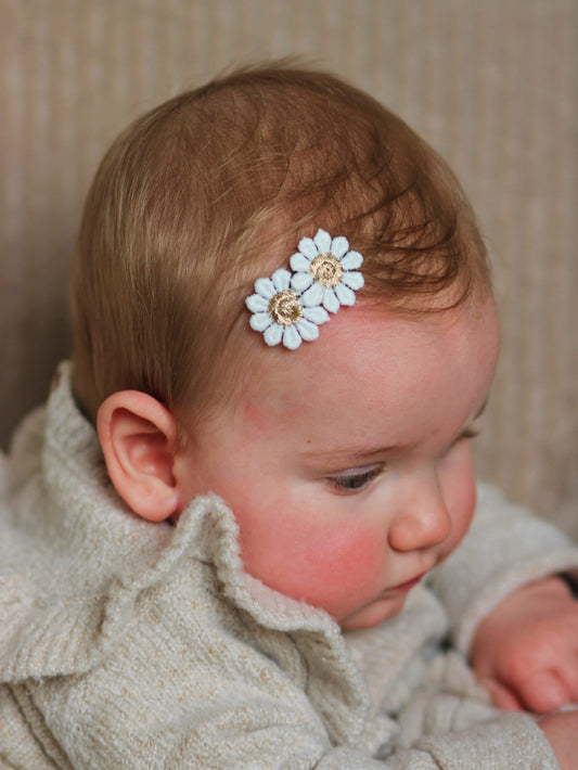 Hoe gebruik je anti-slip haarspeldjes bij fijn babyhaar?