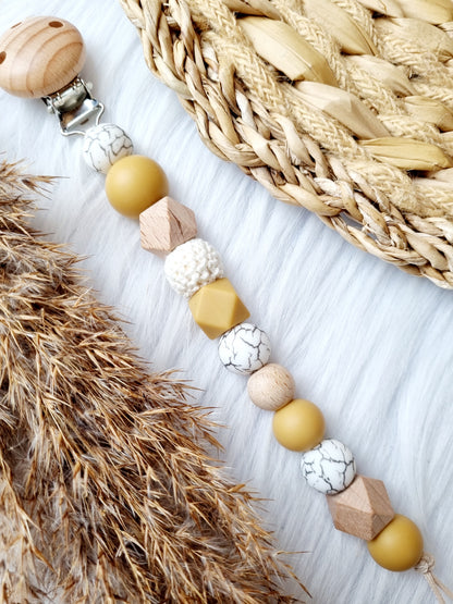 Speenkoord gegraveerd