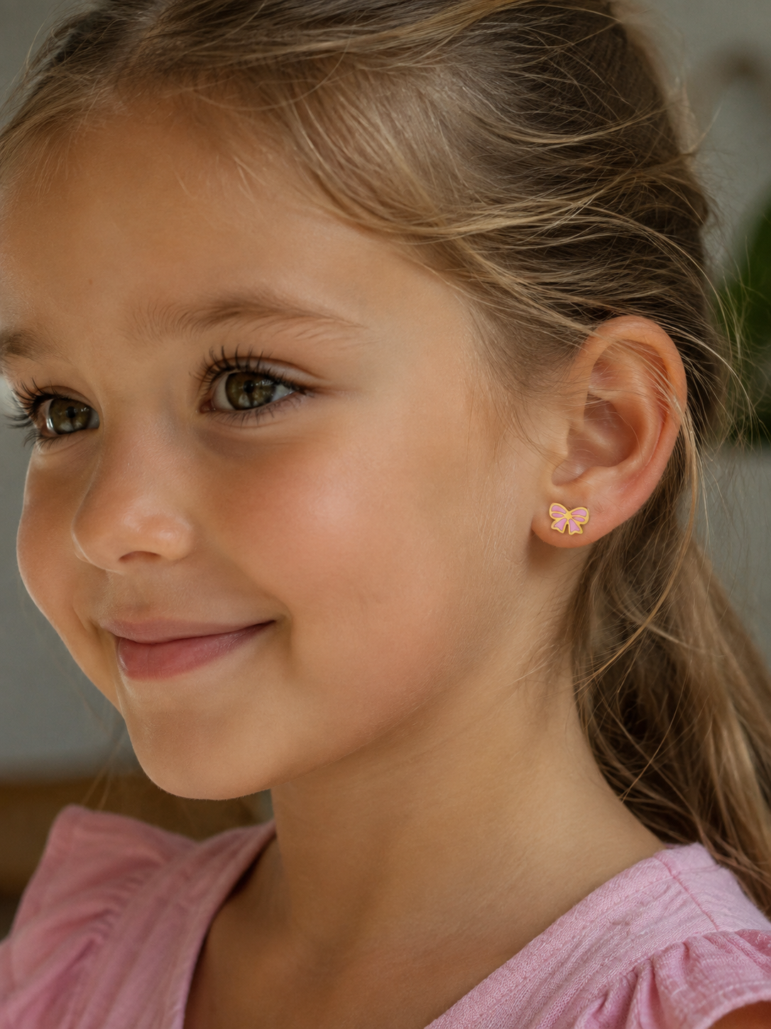 Kinderoorbellen Strik roze goud met schroefsluiting
