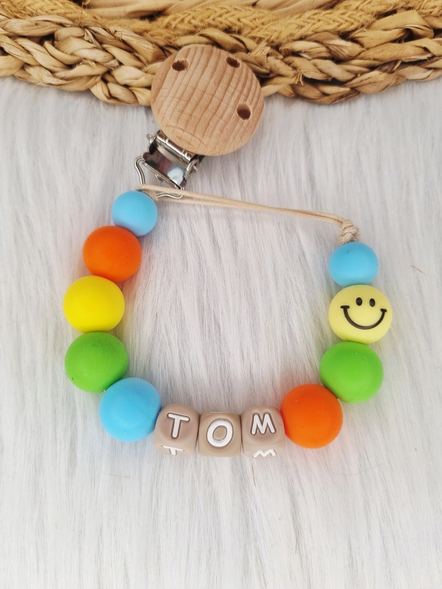 Speenkoord met naam smiley babyblauw, geel, groen,oranje