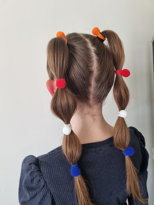 Mini haarelastiekjes met pompons – Koningsdag editie 8 stuks