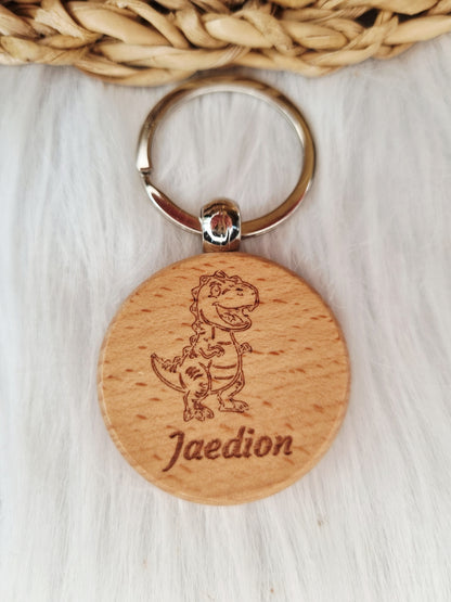 Houten sleutelhanger gegraveerd met naam 
T-rex