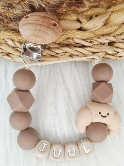 Speenkoord met naam - Croissant Neutral (beige of brownie)