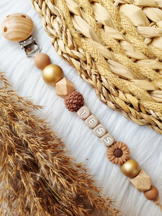 Speenkoord met naam  Daisy bruin, metallic goud, peach brons