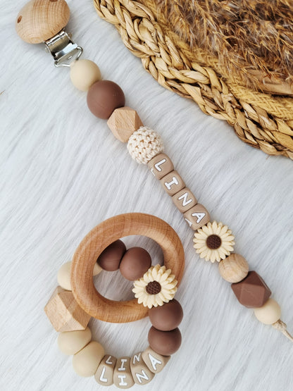 Bijtring daisy beige, brownie met bijpassende speenkoord 