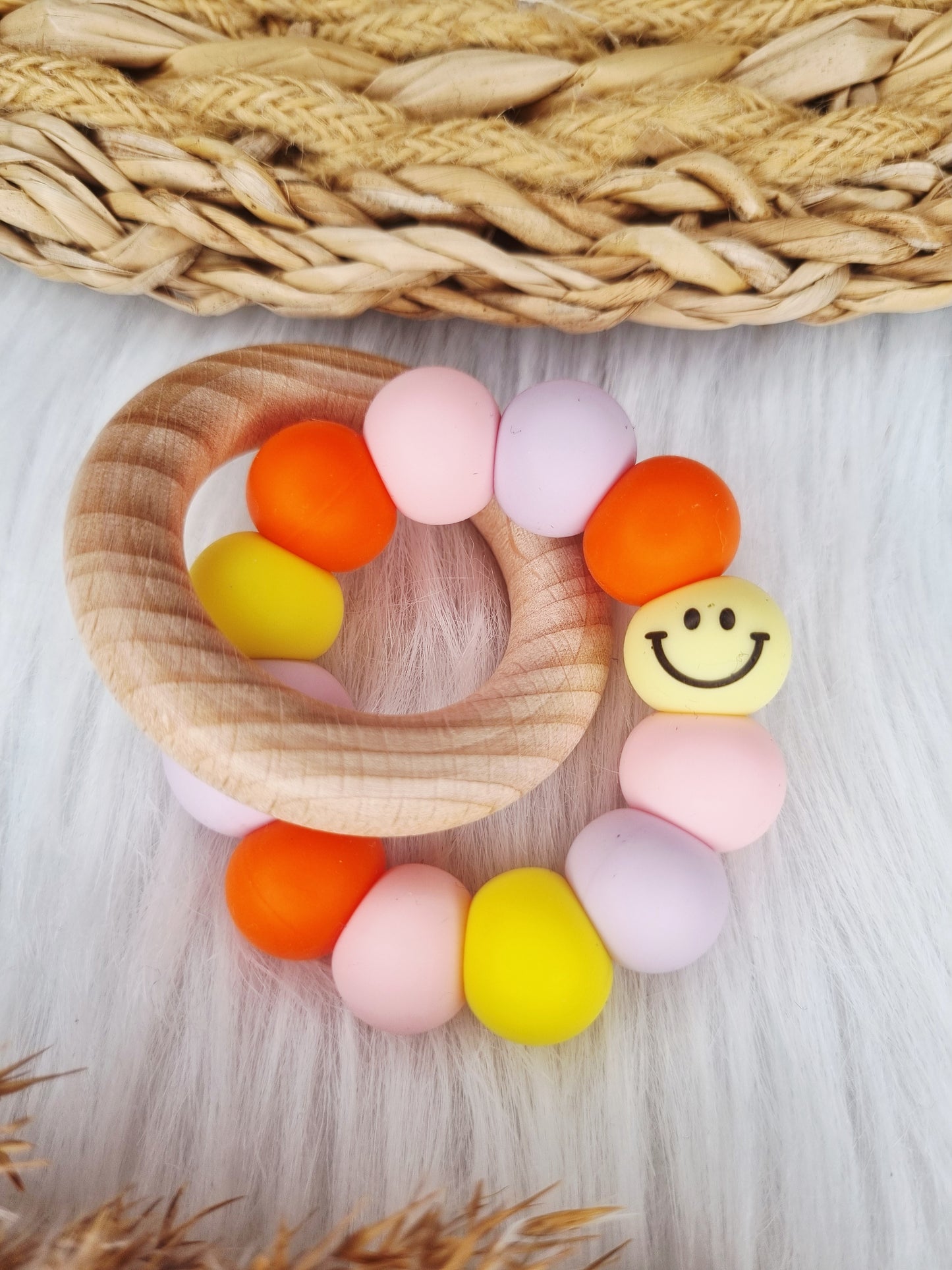 Bijtring met naam - Smiley - babypink, geel, lila, oranje