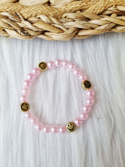 Kinderarmband - Pearl smiley goud roze