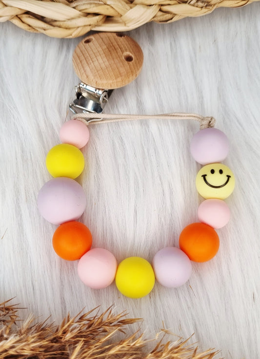 Speenkoord met naam - Smiley, babypink, geel, lila, oranje