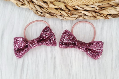 Haarelastiekje strik Glitter (lint)  2 stuks donkerroze