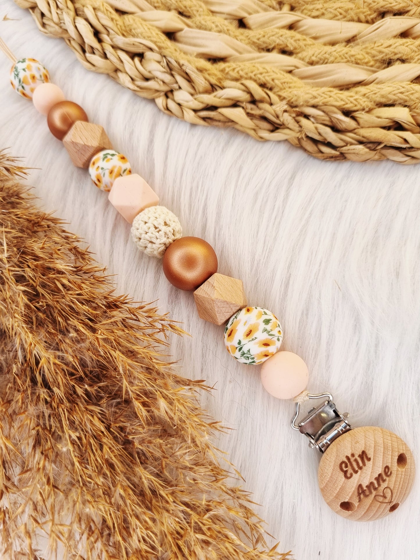 Speenkoord gegraveerd bloem oranje, lightpink, metallic brons