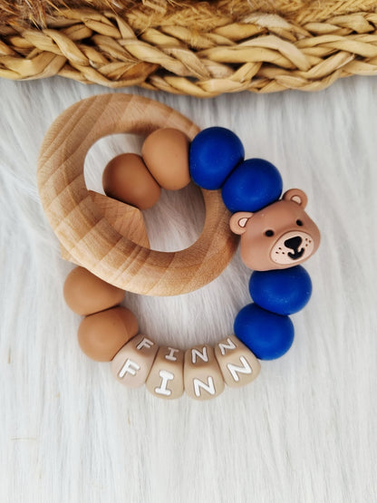 Bijtring met naam jouw ontwerp 
Beer Peach brons, marine