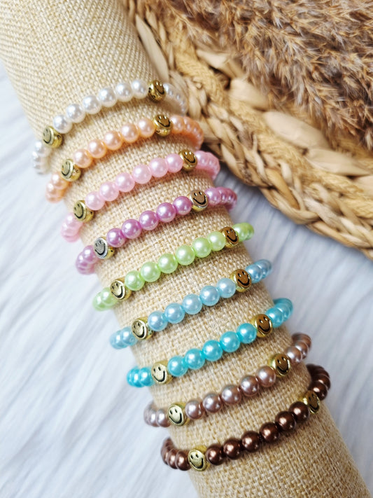 Kinderarmband - Pearl smiley goud